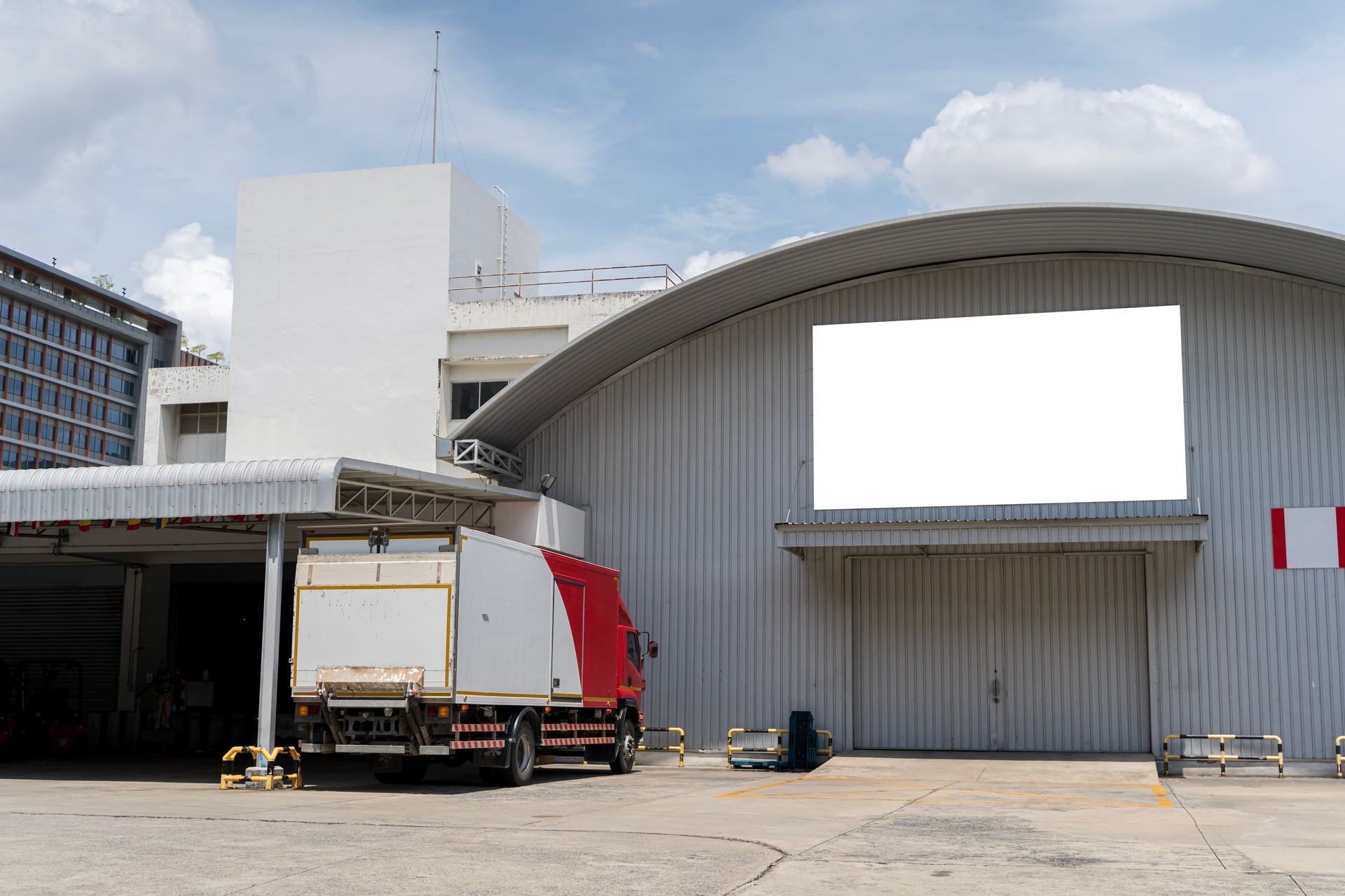 Cargo delivery truck at a modern warehouse enhancing logistics and distribution efficiency